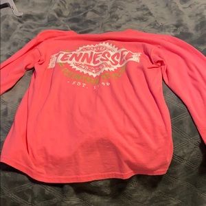 A pink long sleeve shirt that says Tennessee